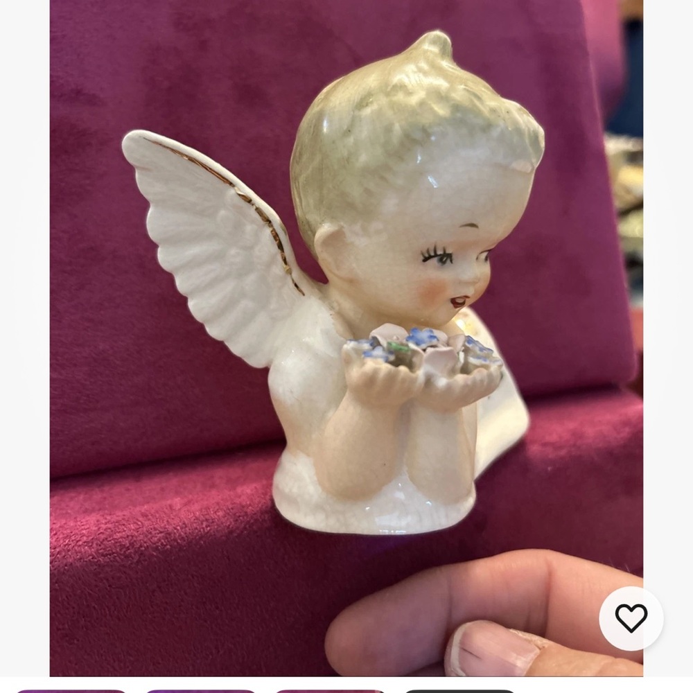 Charming Angel Figurine with Floral Accents